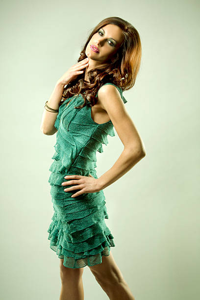 istock brunette and green dress 154267966