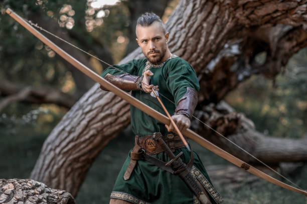 An individual viking archer warrior in the north European forest countryside