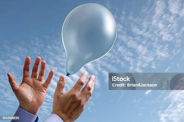 Aspirations Concept With Hands And Balloon Stock Photo - Download Image Now - Balloon, Releasing, Aspirations