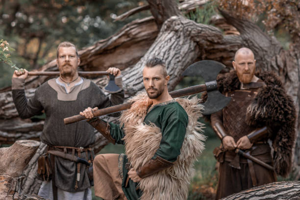 istock Three viking warriors on guard in an autumnal forest 1542688466