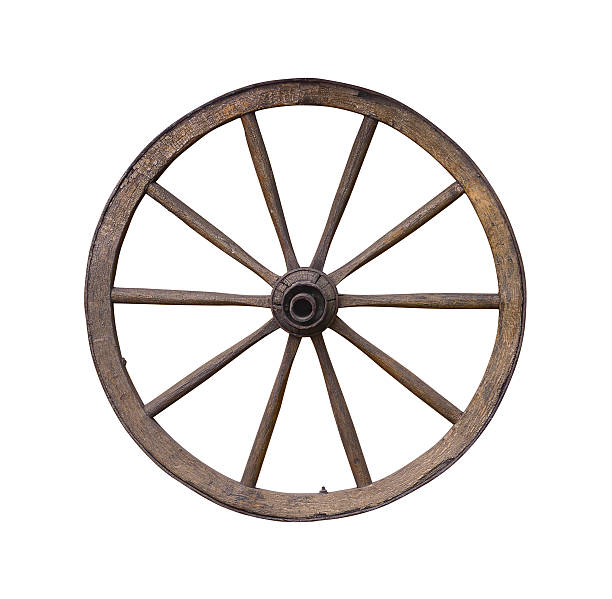 istock Wooden wagon wheel isolated on white background 154270038