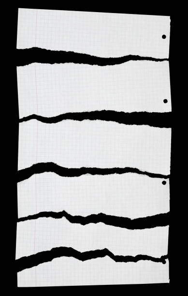 istock White ripped pieces of graph paper on black 1542703217
