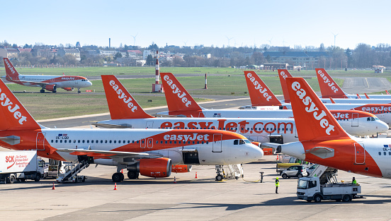 Many Easyjet airplanes at airport at parking position - Berlin Tegel