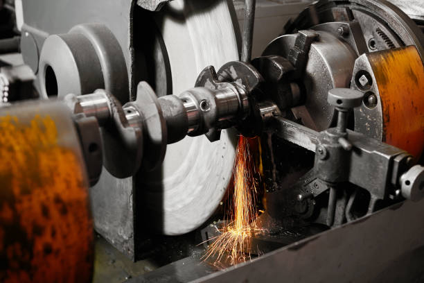 istock Grinding of the crankshaft on a grinding machine. Car tuning, engine power amplification. 1542717046