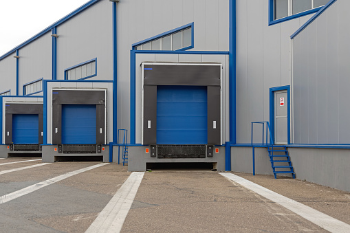 Loading Ramps Dock Doors for Trucks at Distribution Warehouse