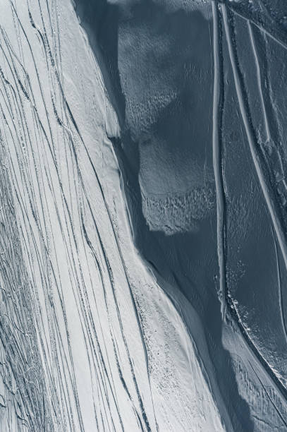 istock deep trace from ski and snowboard on snow winter mountain slope, freeride 1542723830