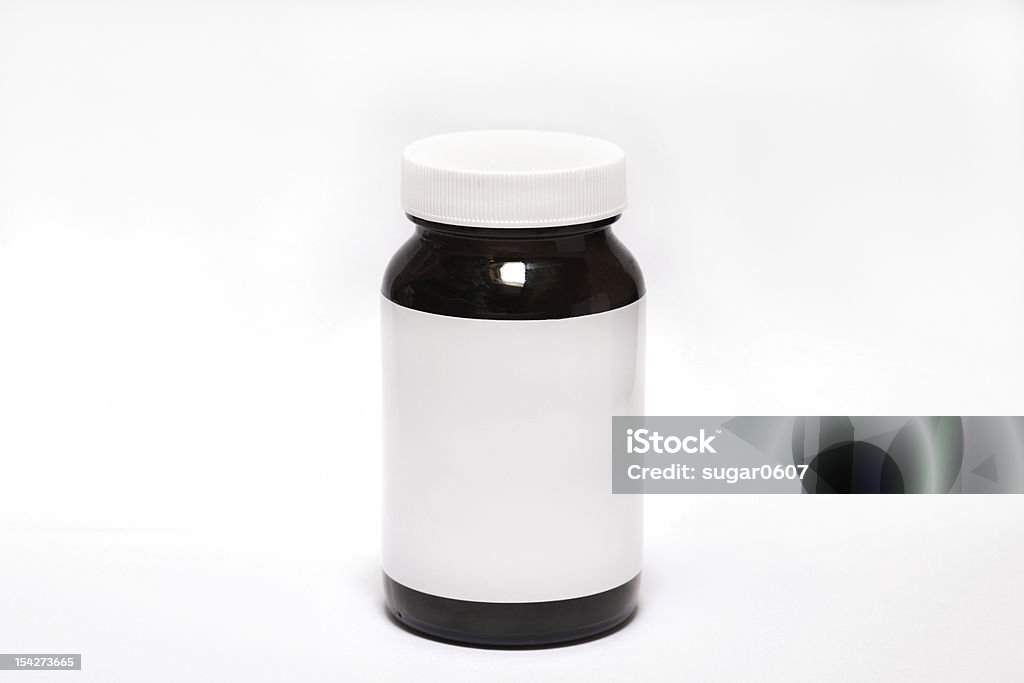 Pill bottle on white background Plastic pill bottle with white empty etiquette on white background Generic Drug Stock Photo