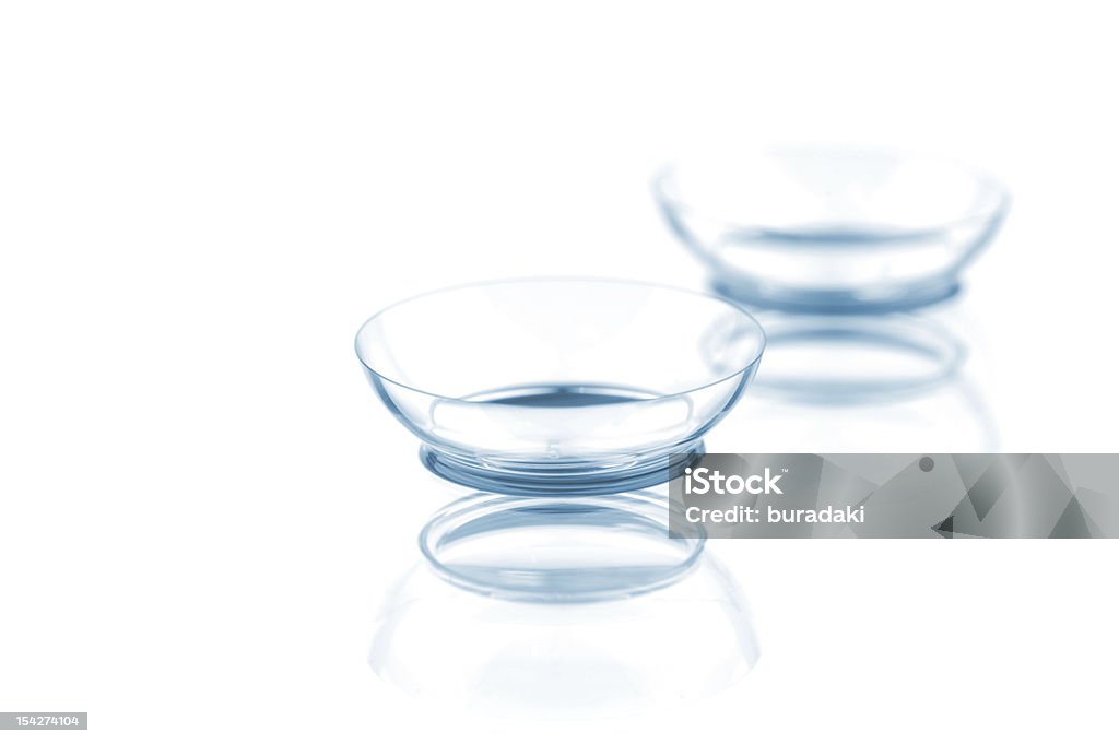 Contact lenses Two contact lenses with reflections, isolated on a white background Contact Lens Stock Photo