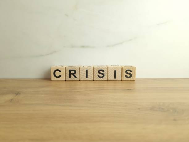 istock Word crisis from wooden blocks 1542756343
