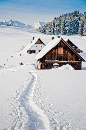 Winter landscape with small hut in the austrian alps