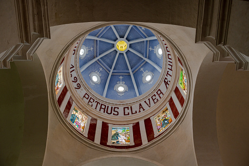 Cartagena, Columbia -- January 11, 2023. A photo looking up into the dome inside of San Pedro Claver Church.