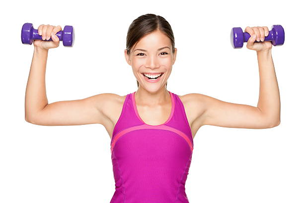 mujer de gimnasio - gym machine smiling coach fotografías e imágenes de stock