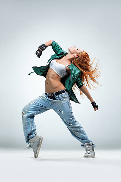istock A woman dancing in jeans and an open jacket 154277715