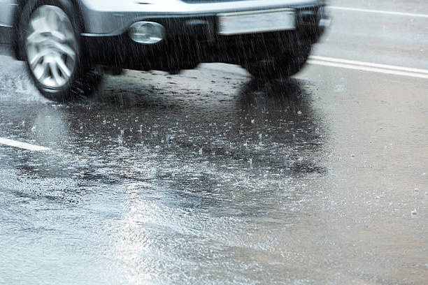 istock Car on wet road 154279750
