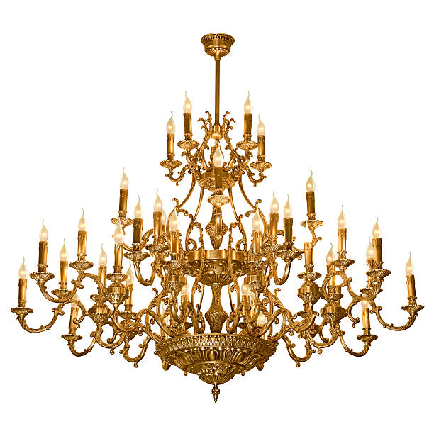 Ornate, tiered, brass chandelier on a white background Vintage chandelier isolated on white background with clipping path chandelier photos stock pictures, royalty-free photos & images