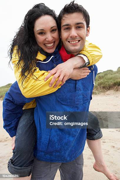 Happy Couple On Beach In Love Stock Photo - Download Image Now - 30-39 Years, Adult, Beach