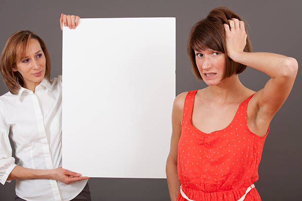 istock frustrated woman and selling agent 154280838