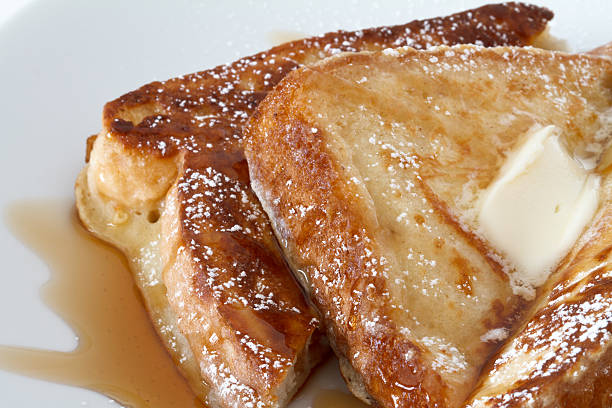 french toast french toast with butter and syrup french toast stock pictures, royalty-free photos & images