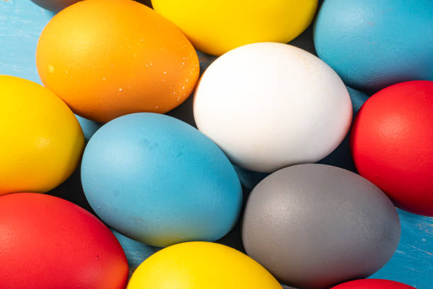 istock eggs painted in different colors to symbolize the passage of Christian Easter 1542813738