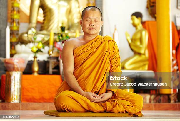 Meditating Monk In A Sacred Shrine Stock Photo - Download Image Now - Monk - Religious Occupation, Buddhism, Meditating