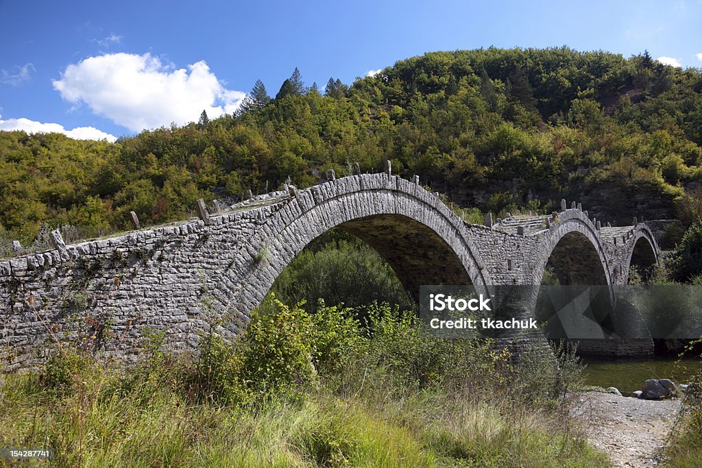 zagorohoria Old Kalogeriko triple arched stone bridge on Vikos canyon, Zagorohoria, Greece Bridge - Built Structure Stock Photo