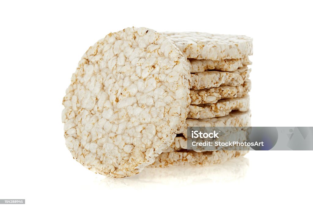 Diet rice cakes pile isolated on white background Diet rice cakes pile isolated on a white background Rice Cake Stock Photo