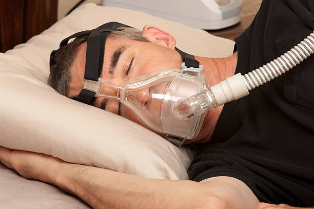 apnea del sueño y cpap - apnea del sueño fotografías e imágenes de stock