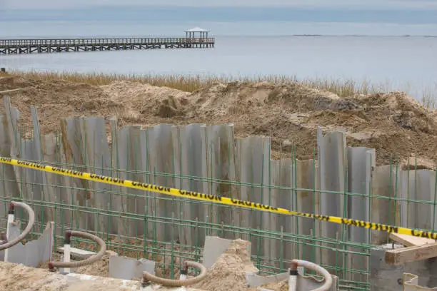 A coastal resiliency project during construction of a seawall on the shores of the Bay of Biloxi in Ocean Springs, Mississippi.