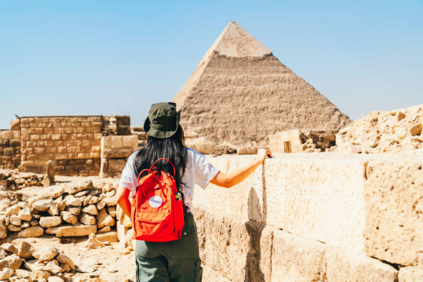 istock asian archaeologist working an research the pyramid pharaoh in Giza Cairo 1542930954