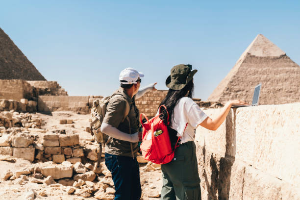 istock Multiracial couple working on their laptops in giza area 1542937369