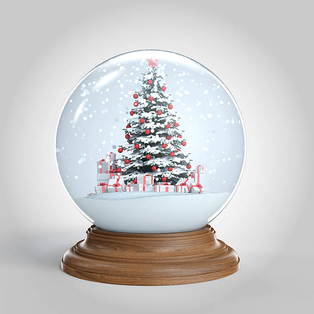 Isolated snow globe with a Christmas tree inside snowglobe with a red decorated christmas tree and presents isoalted on white, clippinh path included snow globe photos stock pictures, royalty-free photos & images