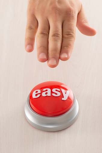 Man reaching red easy button.