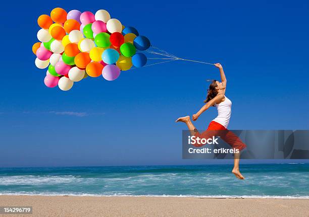 Jumping With Balloons Stock Photo - Download Image Now - 20-24 Years, 20-29 Years, Active Lifestyle