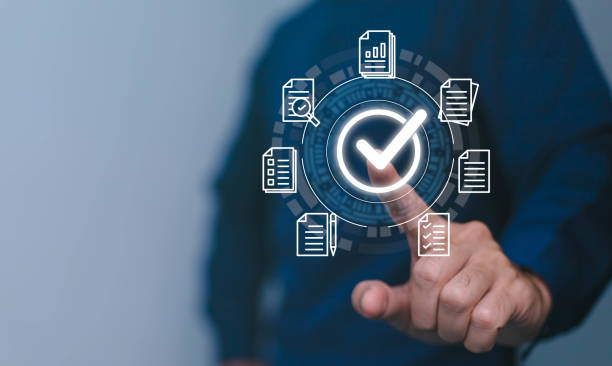 istock Quality management with Quality Assurance or QA and Quality Control or QC and improvement. Standardization, certification concept. Compliance to regulations and standards. Concept with manager. 1542967650