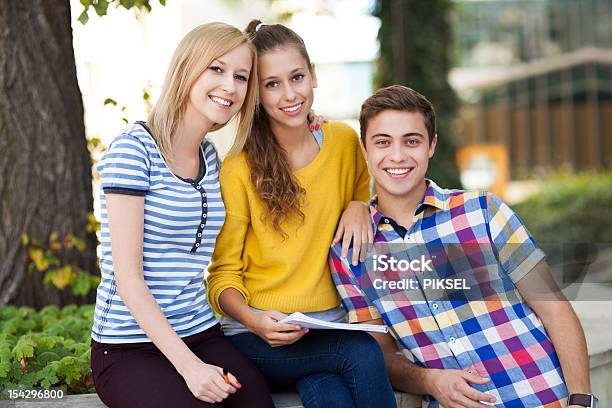 Three Young People Smiling Stock Photo - Download Image Now - Adult, Beautiful People, Beauty