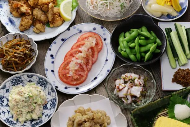 Photo of homemade variety of Japanese food. Izakaya popular menu.