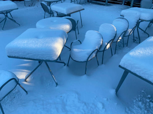 Tables and chairs after winter snow storm - Lincoln, MA