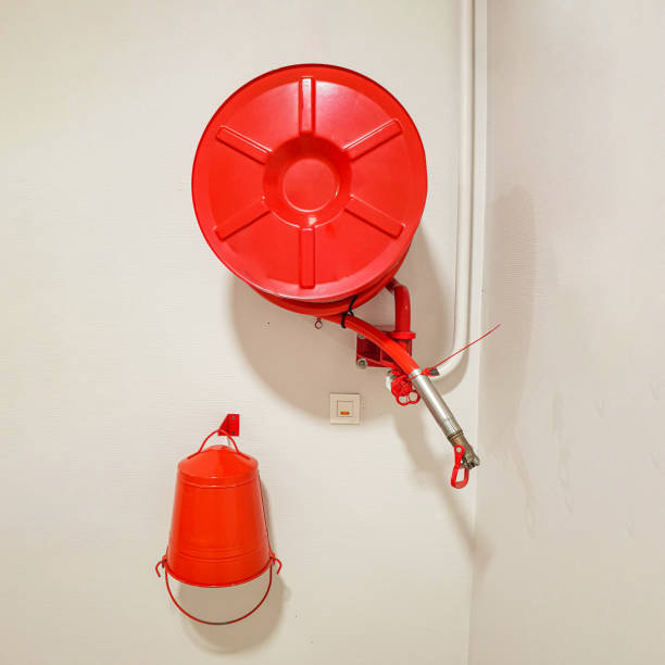 istock fire hose and bucket 1543030034