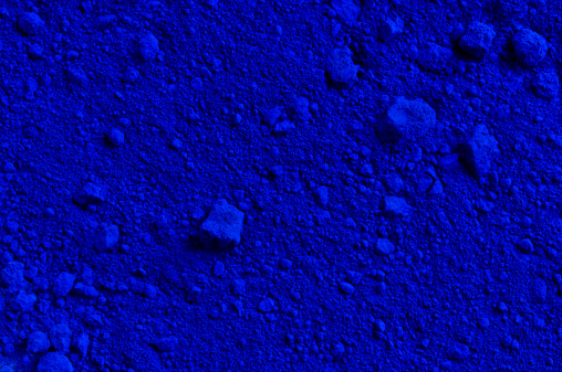 Blue powder background - it could be industrial pigment, textile dye, make-up powder, grocery dye...