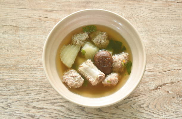 istock boiled slice radish chop pork and bone with black mushroom soup 1543084069