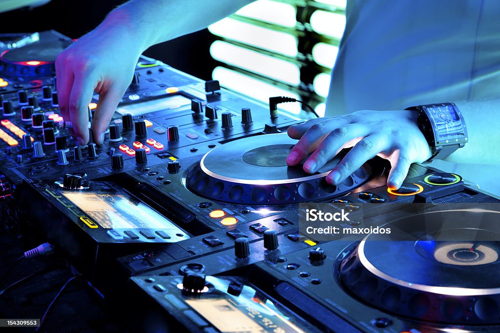 Nightclub in Moscow at party Dj mixes track in nightclub at party DJ Stock Photo
