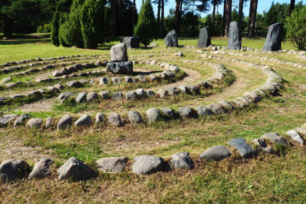 Stone labyrinth near the Devil's Stul rock on Lake Onega. Zaozerye, Petrozavodsk, Karelia, Russia. A magical place for the rituals of the ancient Karelians and Finns. Ethnographic northern tourism. stock photo