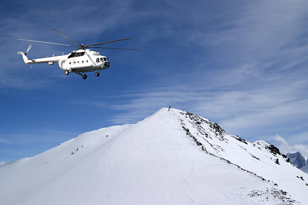 istock Heliski in snowy mountains 154311711