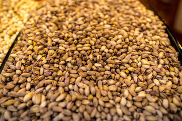 Pistachio nuts in abundance for sale on the street market stand in Istanbul, Turkey