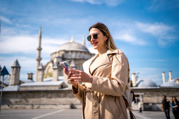 Woman using phone in Istanbul