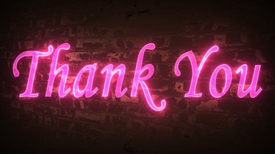 Neon sign text Thank you.  Brick wall with the words Thank you written in bright orange at night. Messages of thanks, joy, and thankfulness. 3D representation
