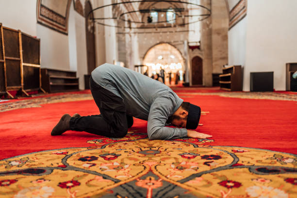 istock Religious Muslim man praying in a mosque 1543160890
