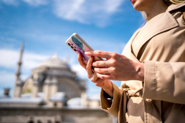 Woman using phone in Istanbul