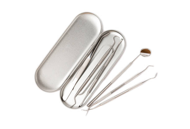 istock Dental instruments isolated on white background. Professional tools for oral care. Whitens teeth, stimulates gums, removes plaque and tartar. Clean teeth.Dentistry concept. mockup 1543178269