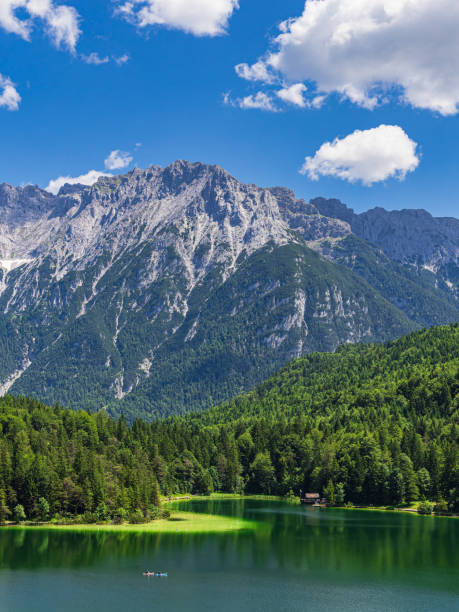 view over the lautersee lake to the karwendel mountains near mittenwald, germany - lautersee lake imagens e fotografias de stock